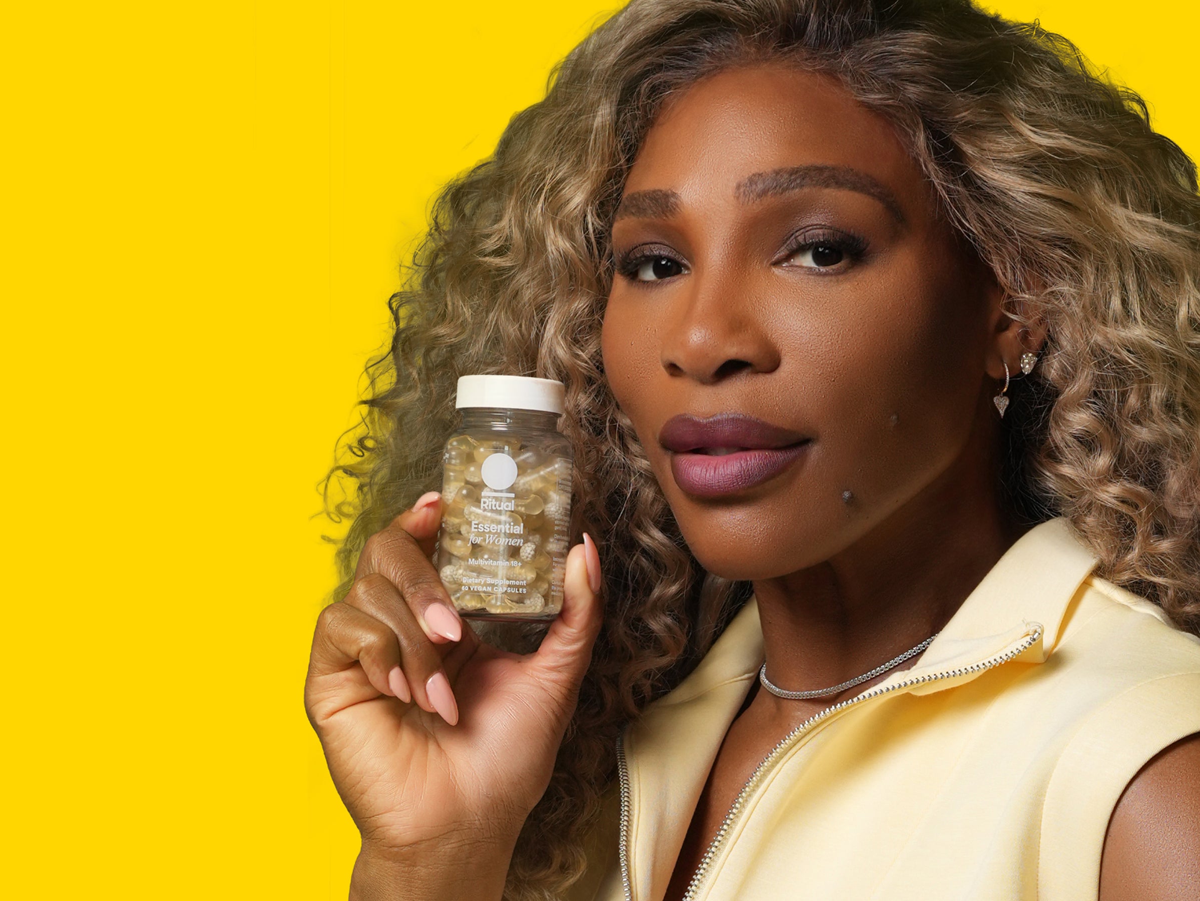 Sirena Williams holding Ritual Essential Multivitamin